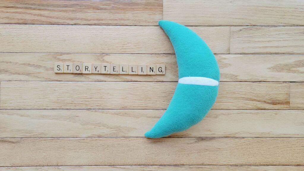 Moonsail North moon and Scrabble pieces spelling Storytelling